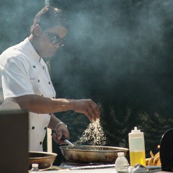 Chef Sarah Koob caramelizing sugar